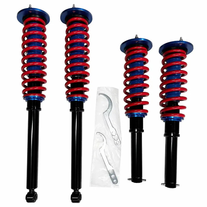 Air suspension to coilover conversion strut with red coil spring and gas-filled shock for Mercedes-Benz W221 4Matic